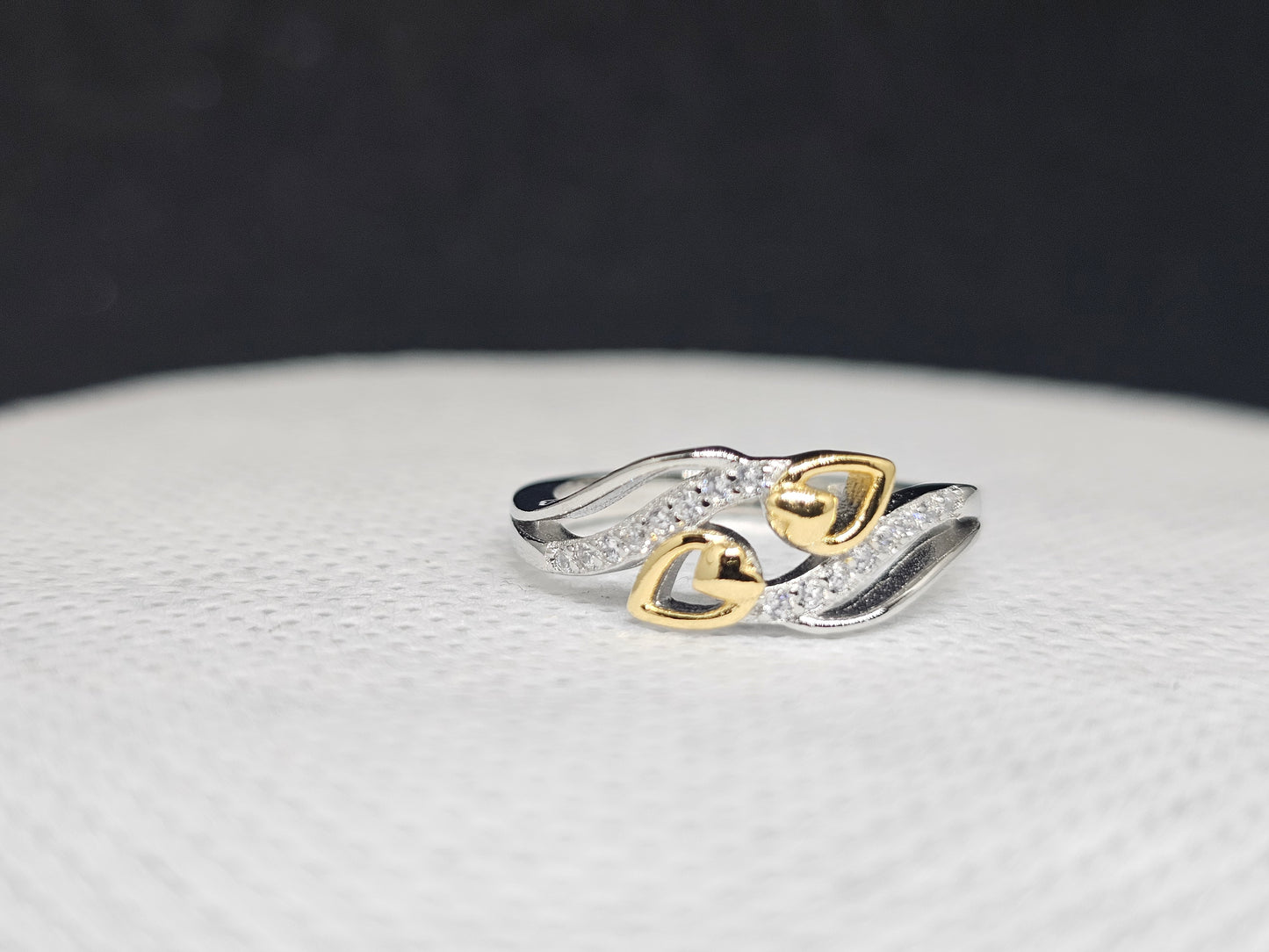 Pure Silver Women Ring with Gold Coated Hearts and White Stones - SilverCarats