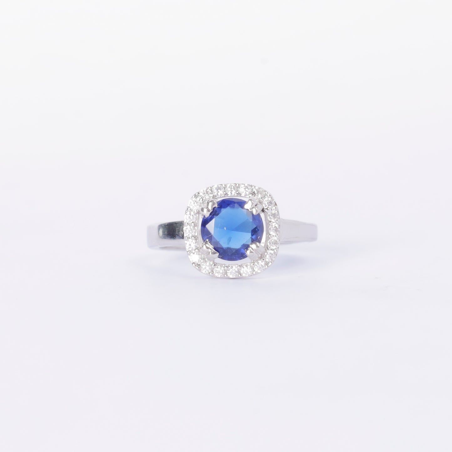Blue Solitaire Sapphire and Diamond Halo Ring