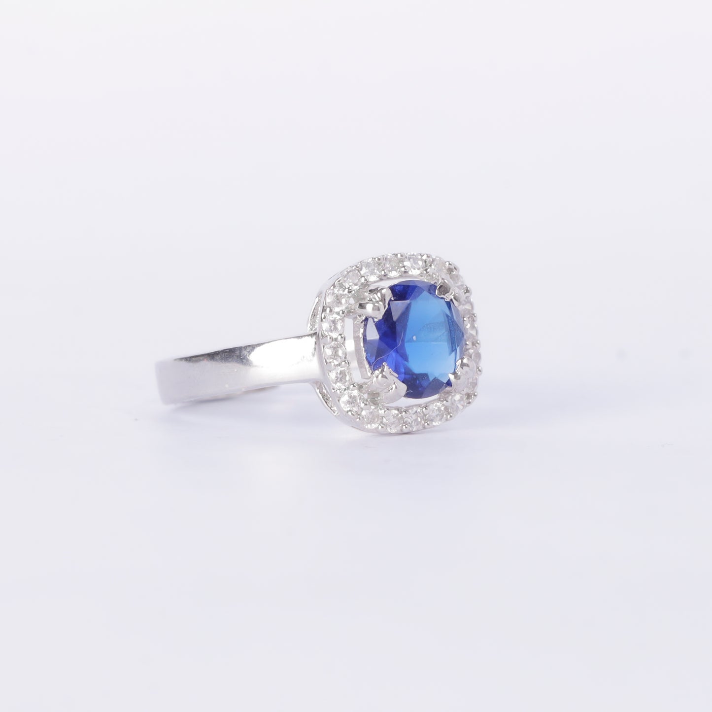 Blue Solitaire Sapphire and Diamond Halo Ring