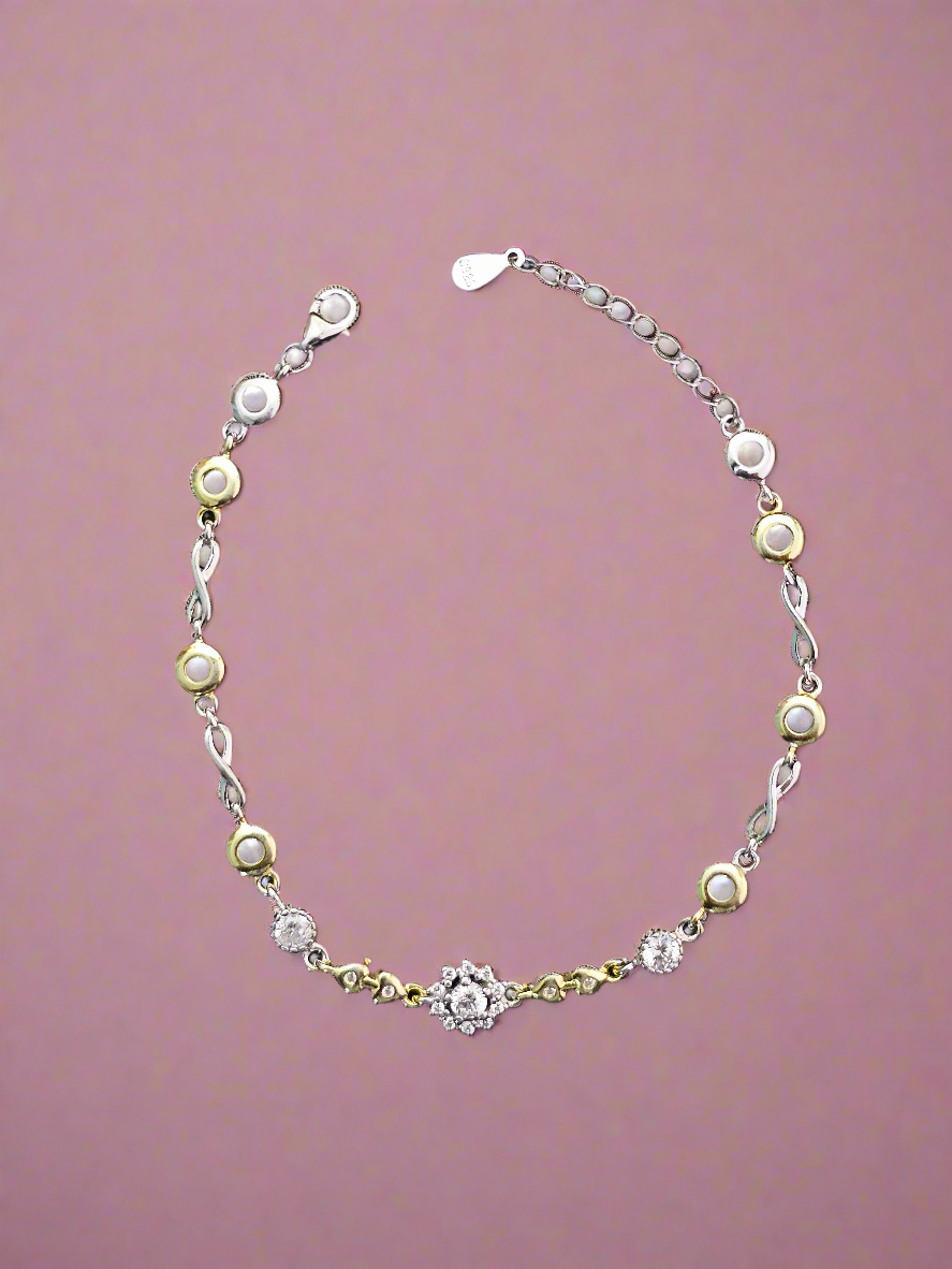 Elegant Two-Tone Infinity & Circle Link Bracelet with Cubic Zirconia Accents