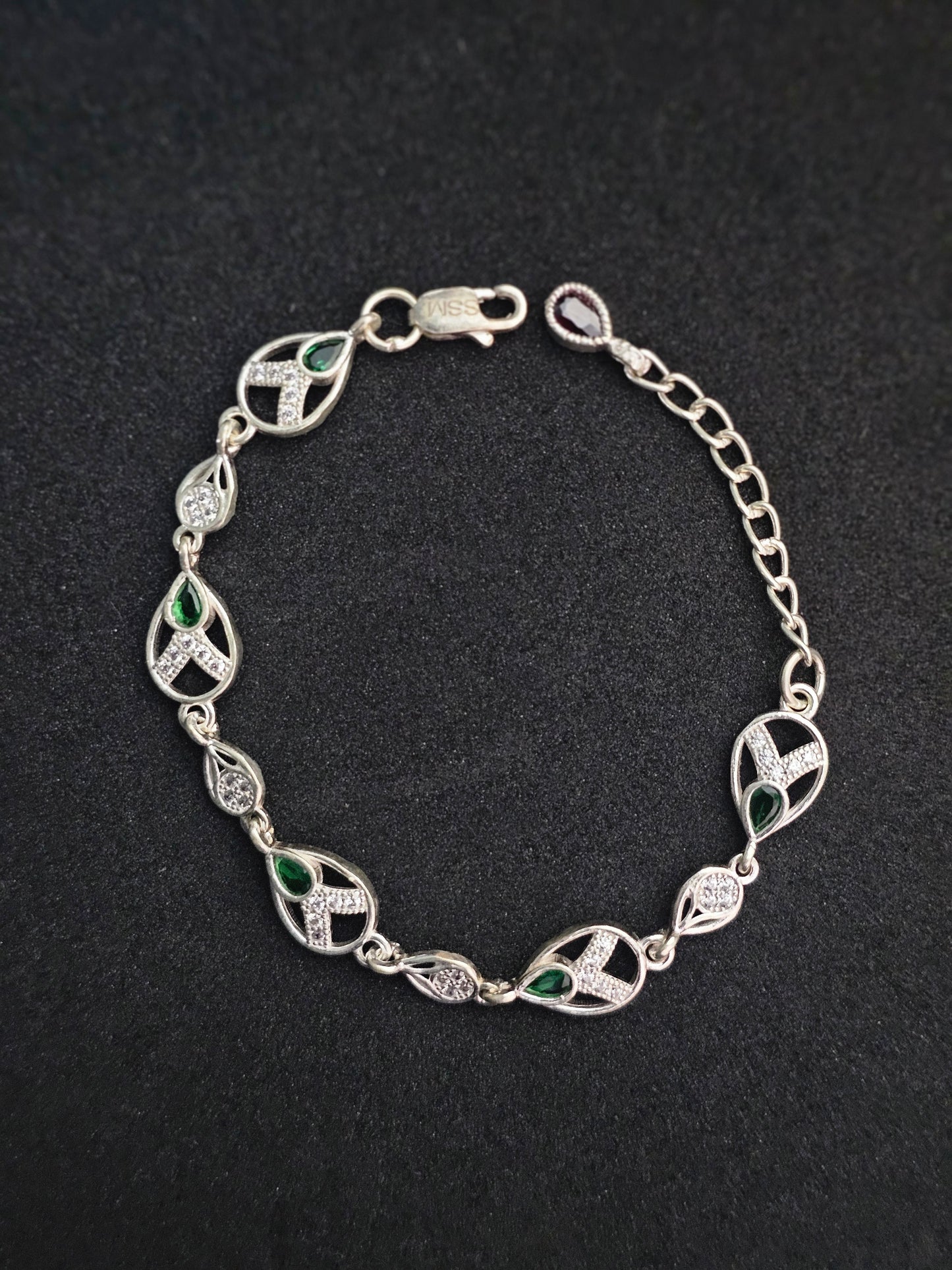 Elegant Sterling Silver Bracelet with Green and White Accents