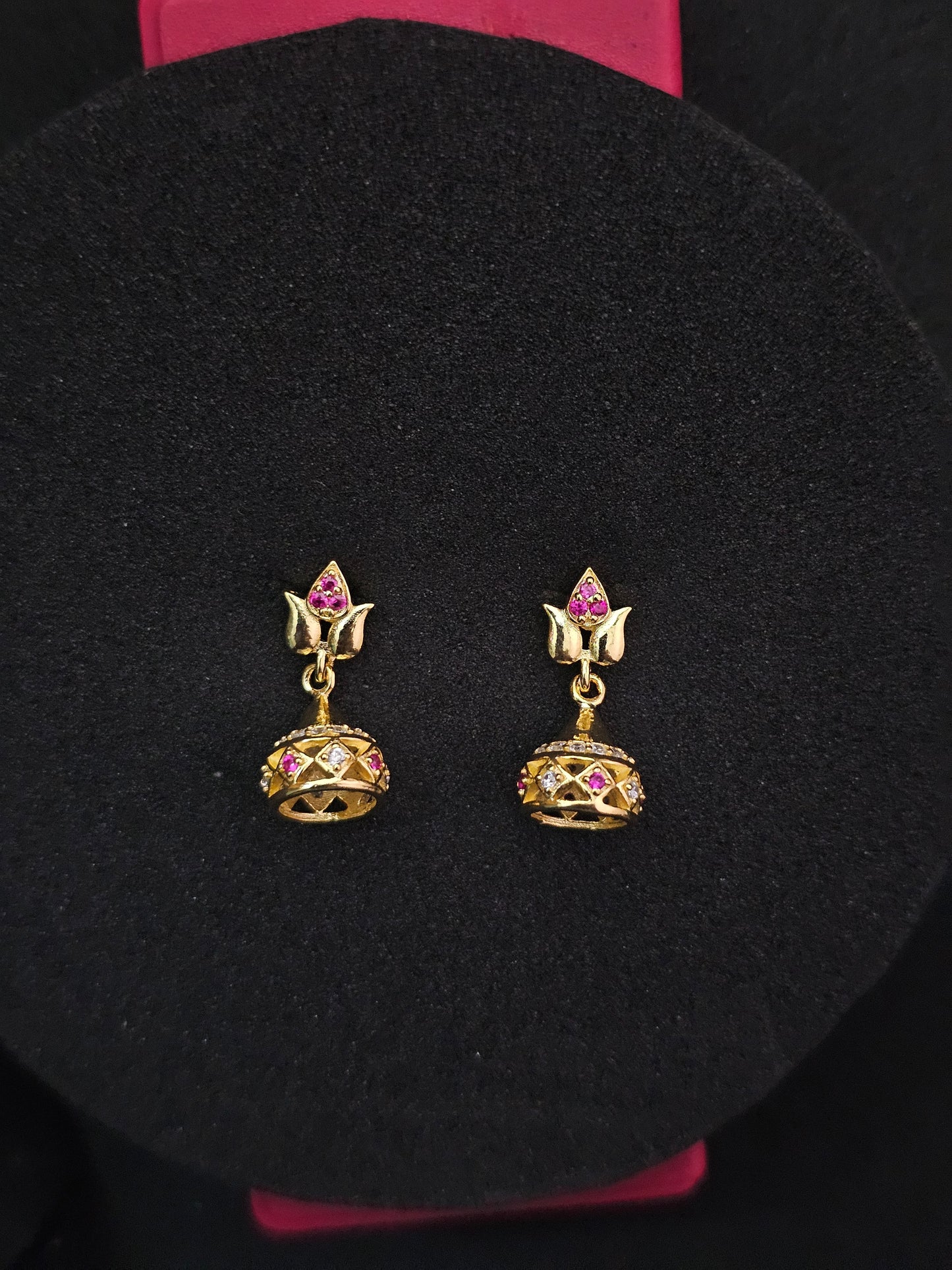 Elegant Gold-Toned Jhumka Earrings with Ruby and Cubic Zirconia Accents