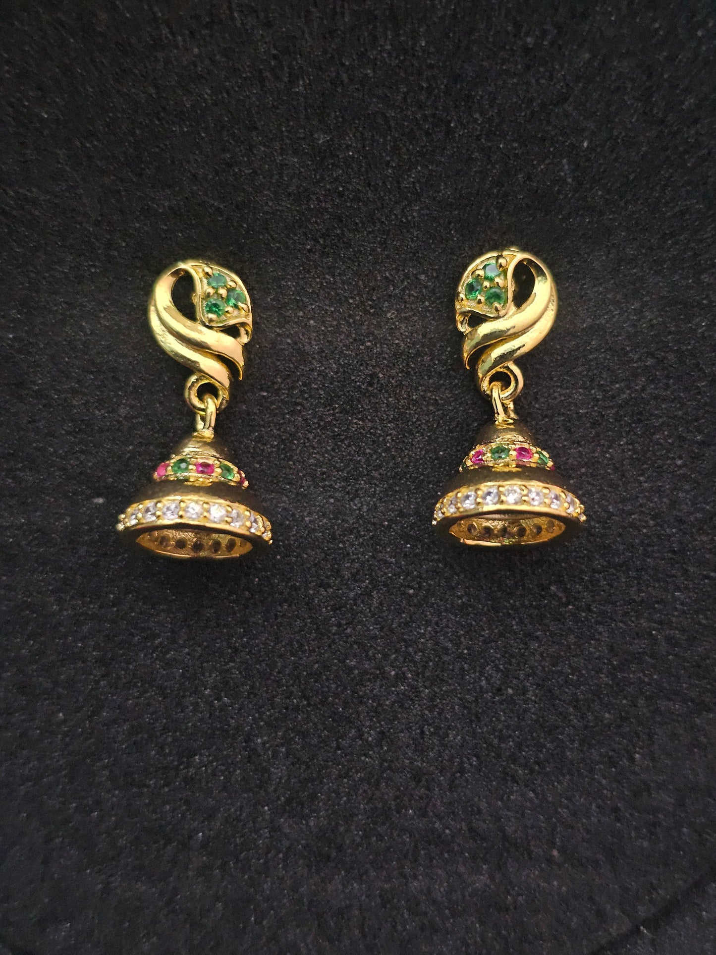 Elegant Gold Tone Jhumka Earrings with Gemstone Accents