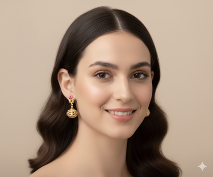 Elegant Gold-Toned Jhumka Earrings with Ruby and Cubic Zirconia Accents