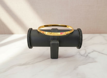 Elegant Gold Kada with Wave Design