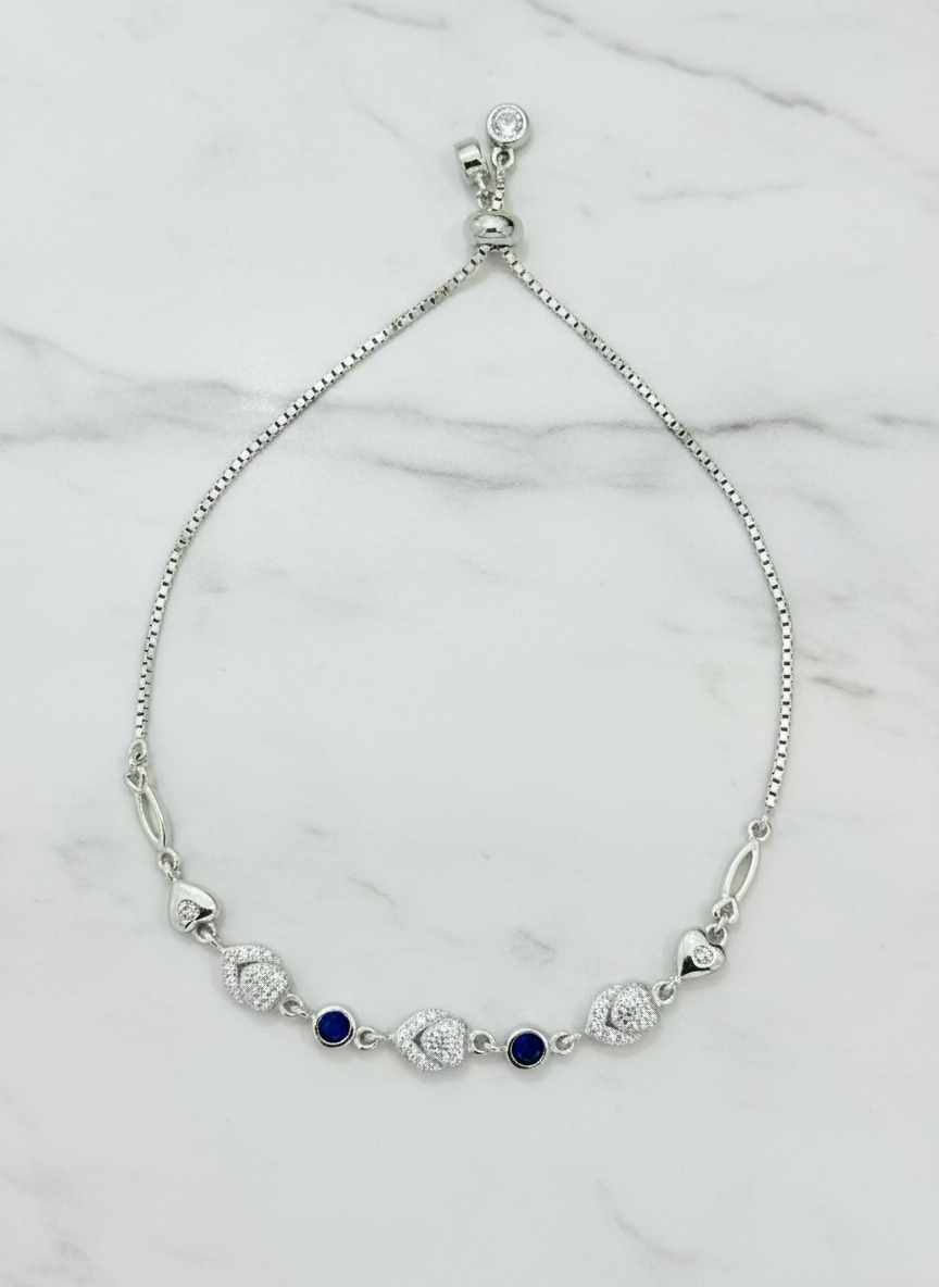 Sparkling CZ & Blue Sapphire-Style Bolo Bracelet - Adjustable Sterling Silver Tone