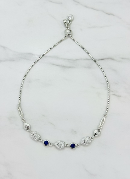 Sparkling CZ & Blue Sapphire-Style Bolo Bracelet - Adjustable Sterling Silver Tone