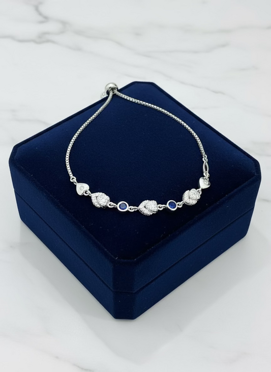 Sparkling CZ & Blue Sapphire-Style Bolo Bracelet - Adjustable Sterling Silver Tone