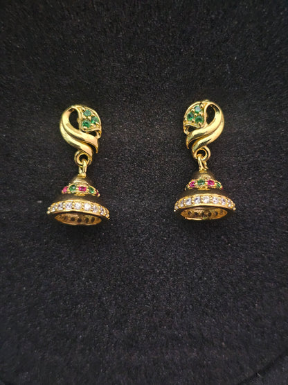 Elegant Gold Tone Jhumka Earrings with Gemstone Accents