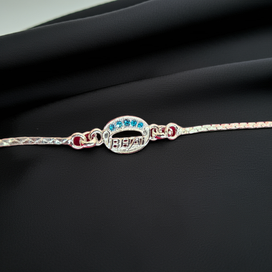 Silver "Bhai" Bracelet Rakhi with Blue Stone – A Bond Beyond Words